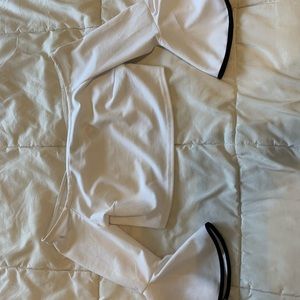 Cropped white shirt with fringe sleeves